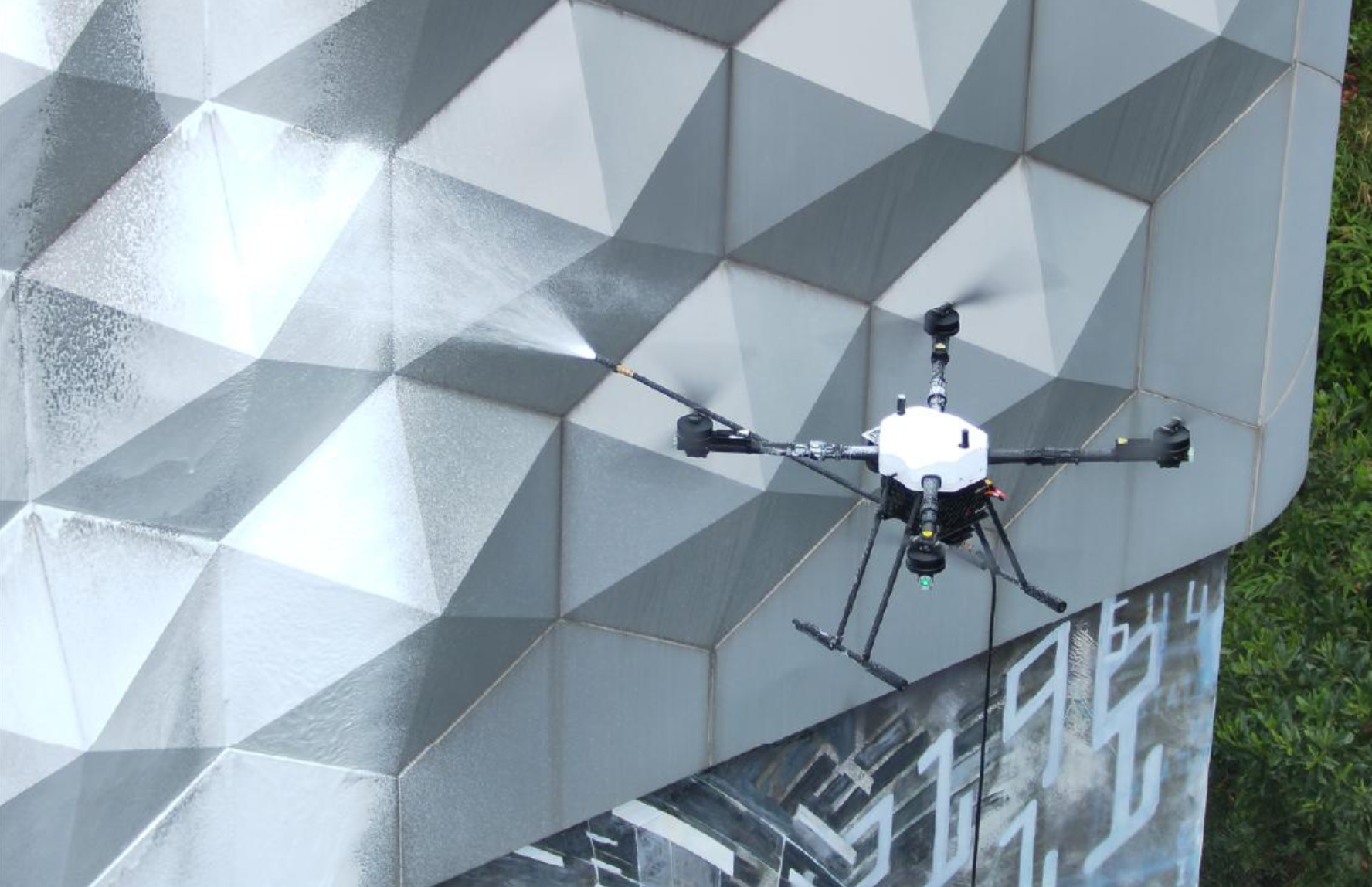 Drone cleaning irregular building exterior surface