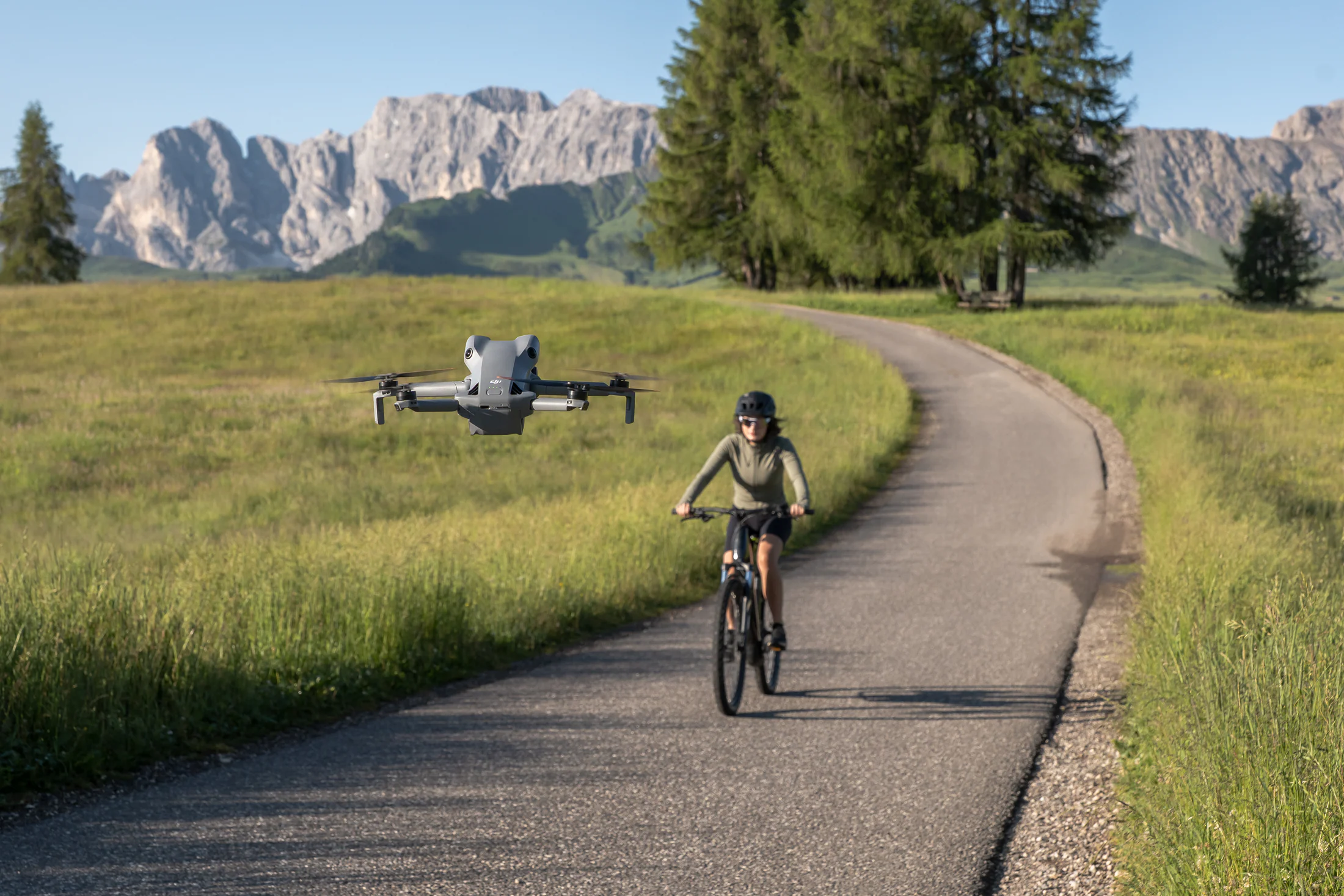 DJI Mini 5 Pro tracking a cyclist