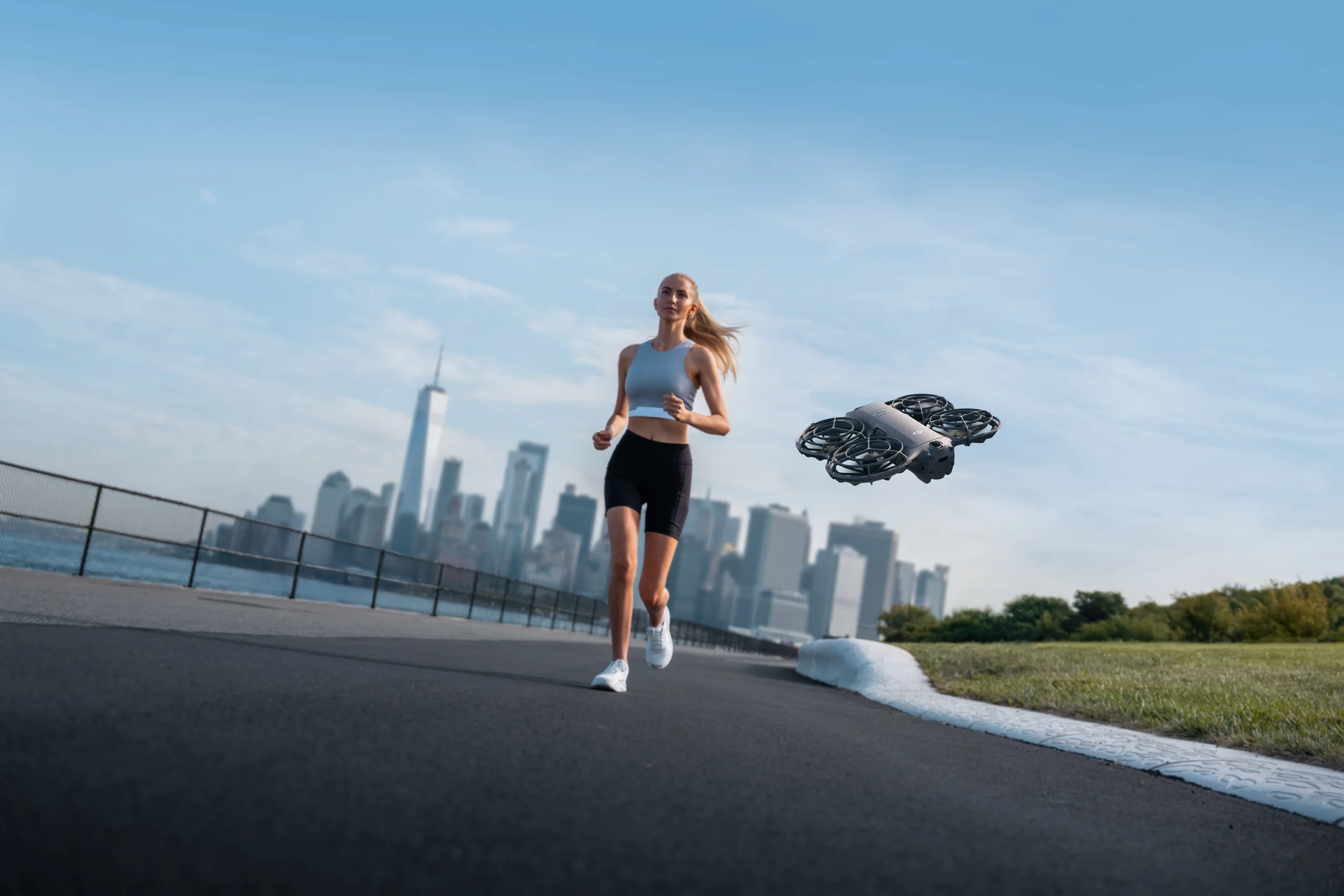 DJI Neo 2 following a runner through a city