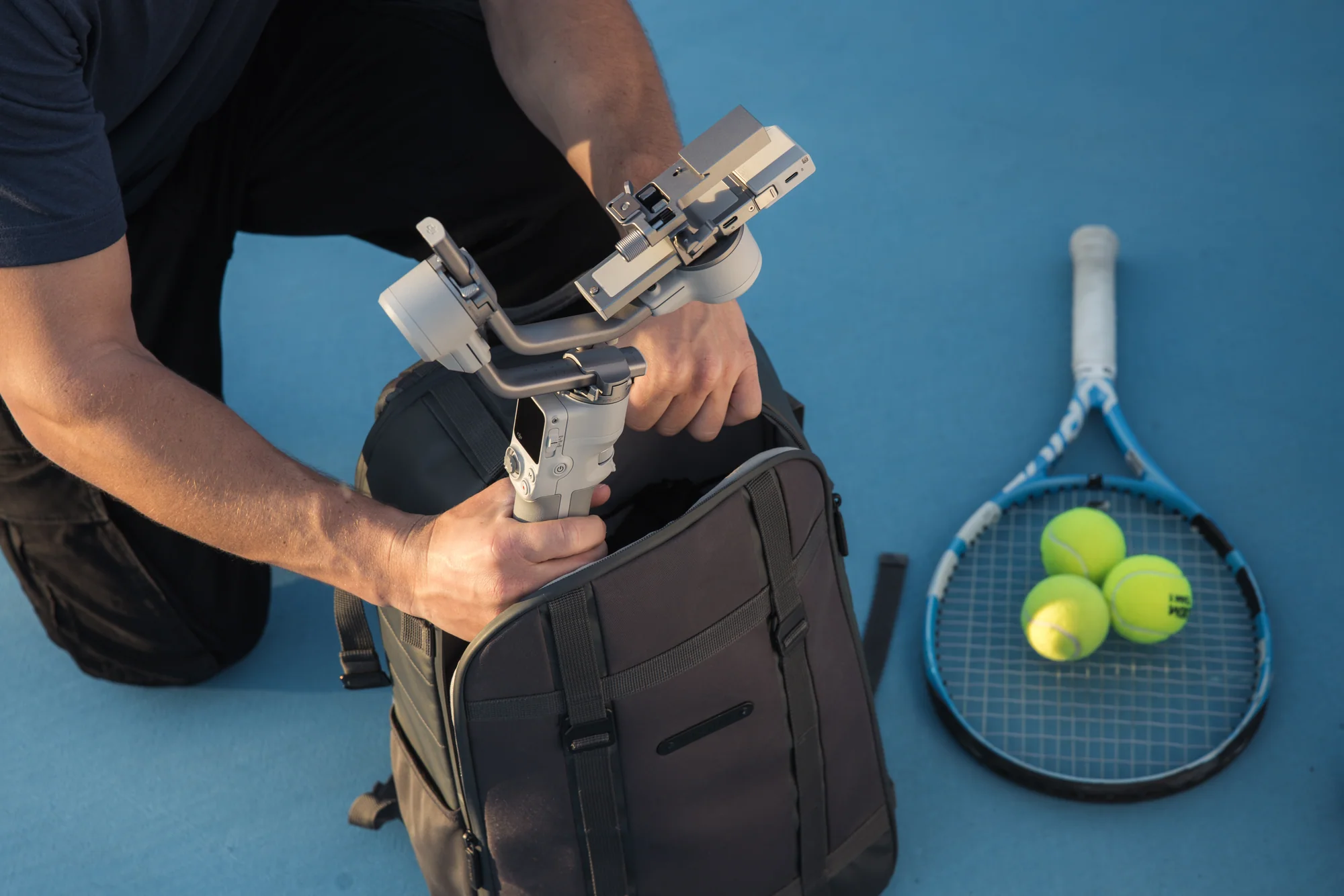 DJI RS 4 Mini folded into a camera bag