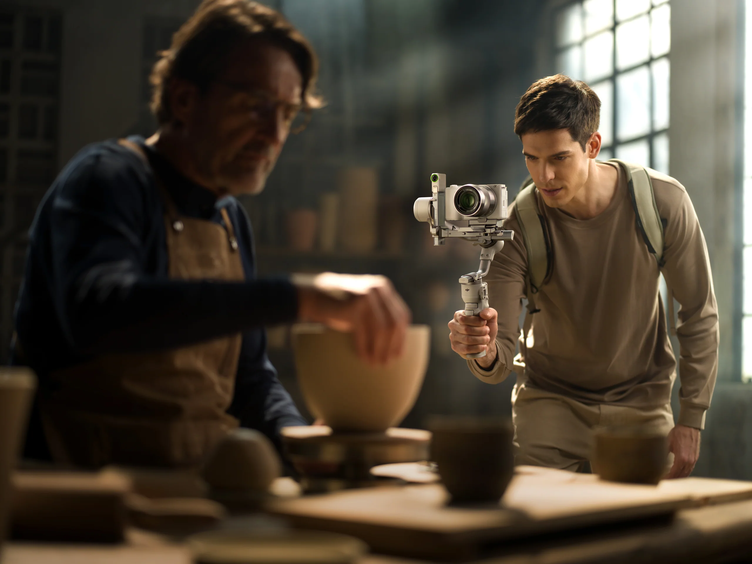Solo creator framed by a DJI RS 4 Mini camera setup