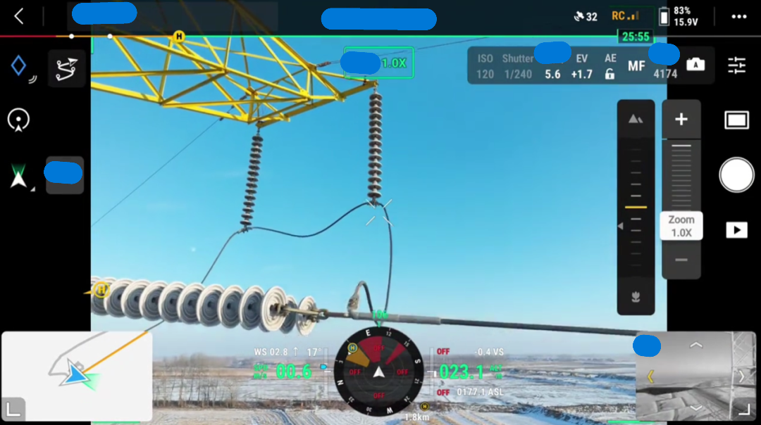 Drone capturing transmission tower hardware detail