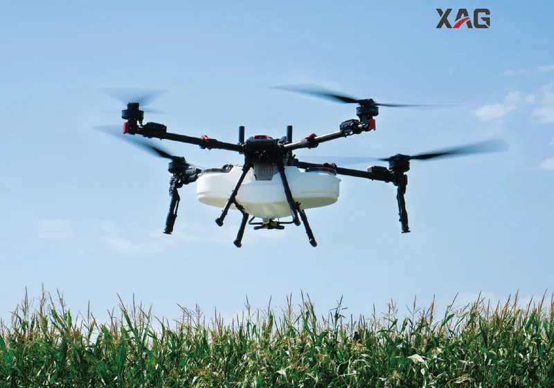 XAG P150 Max agricultural drone spraying a Canadian crop field