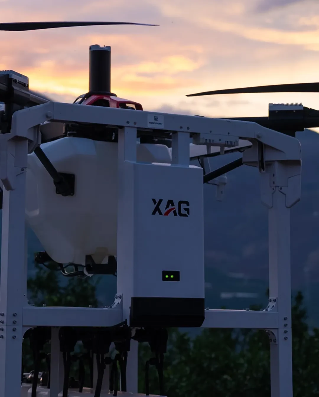X Series drone seated in its dock at sunset